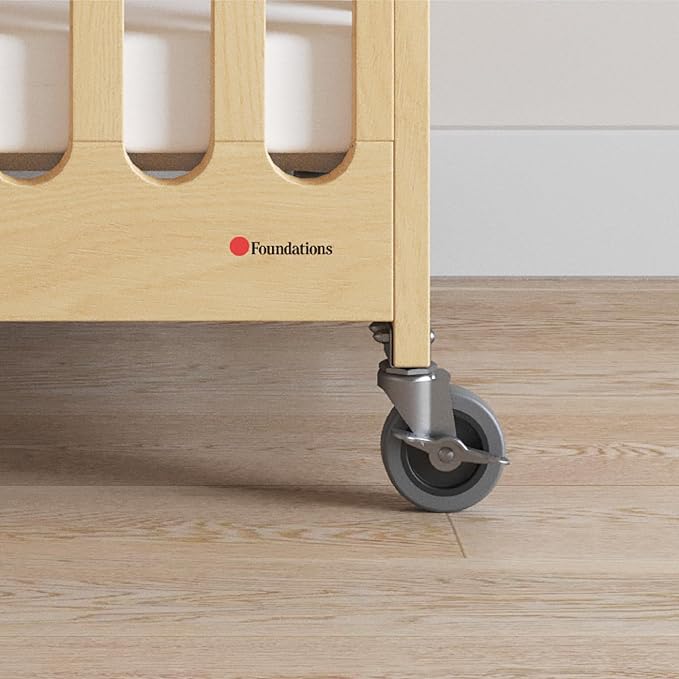 Foundations Boutique Folding Mini Baby Crib - Compact, Portable, Wooden Hotel Crib, Foldable Mini Cribs for Baby & Toddlers - Includes 3" Foam Mattress - Natural